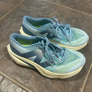 New Balance FuelCell Rebel v4 Womens Size 7 Quarry Blue Running Shoes WFCXCH4